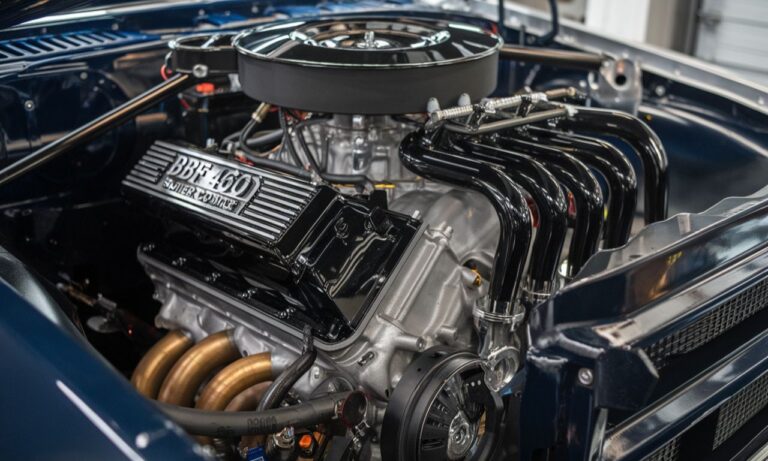 A detailed image of BBF 460 Super Cobra Jet headers installed in a high-performance engine.